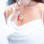 Dezso Tan Cord Necklace with Grande Carved Lemon Quartz Urchin Charm and Cornetto Charm with Sapphire