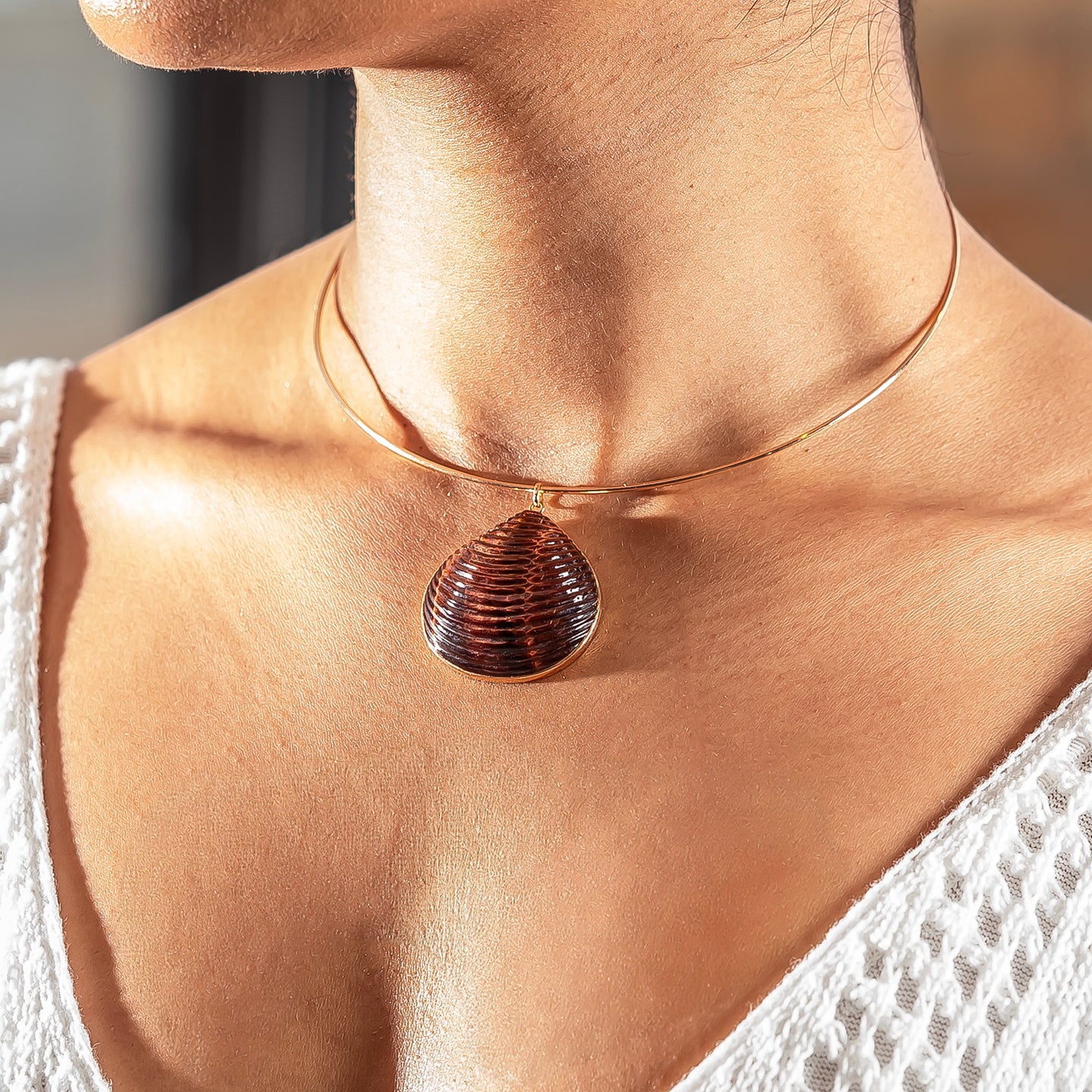 Dezso Carved Red Tiger's Eye Shell Charm