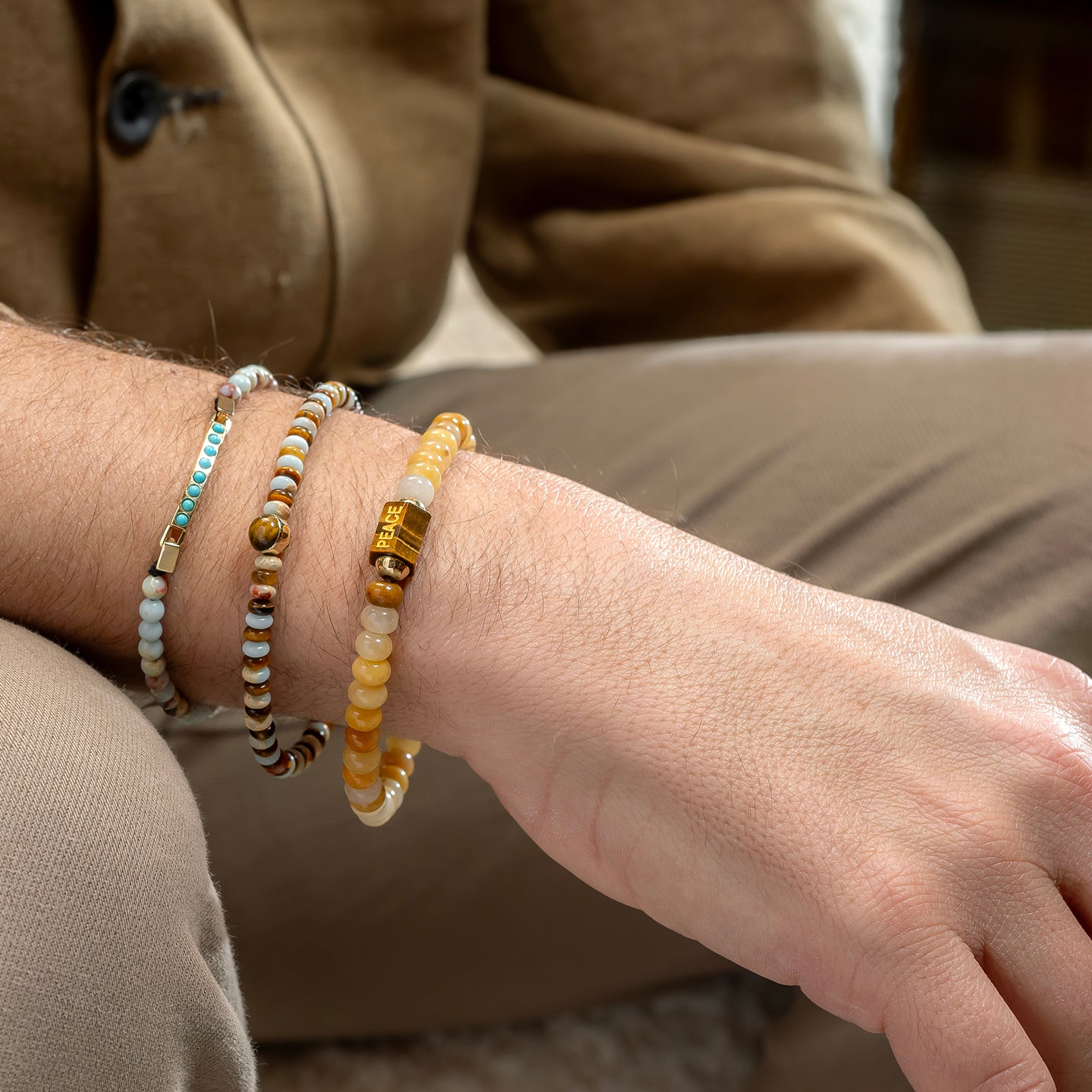 Luis Morais Medium Hexagon Tiger's Eye Bolt Bead with Carved and Enameled 'Peace' on Gemstone Beaded Bracelet
