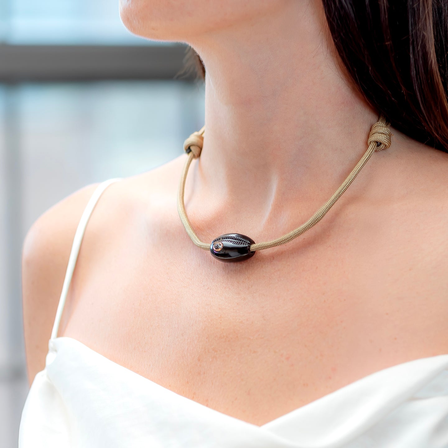 Dezso Classic Onyx Cowrie Bead with Sillimanite on Tan Cord Necklace